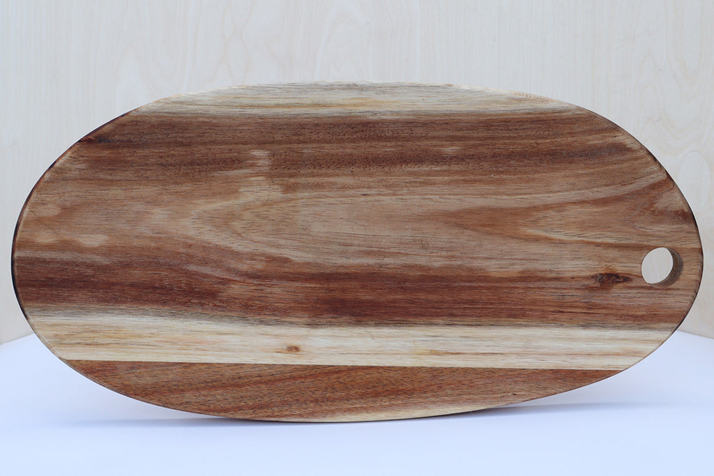 gorgeous charcuterie board made with sustainable acacia wood in portugal